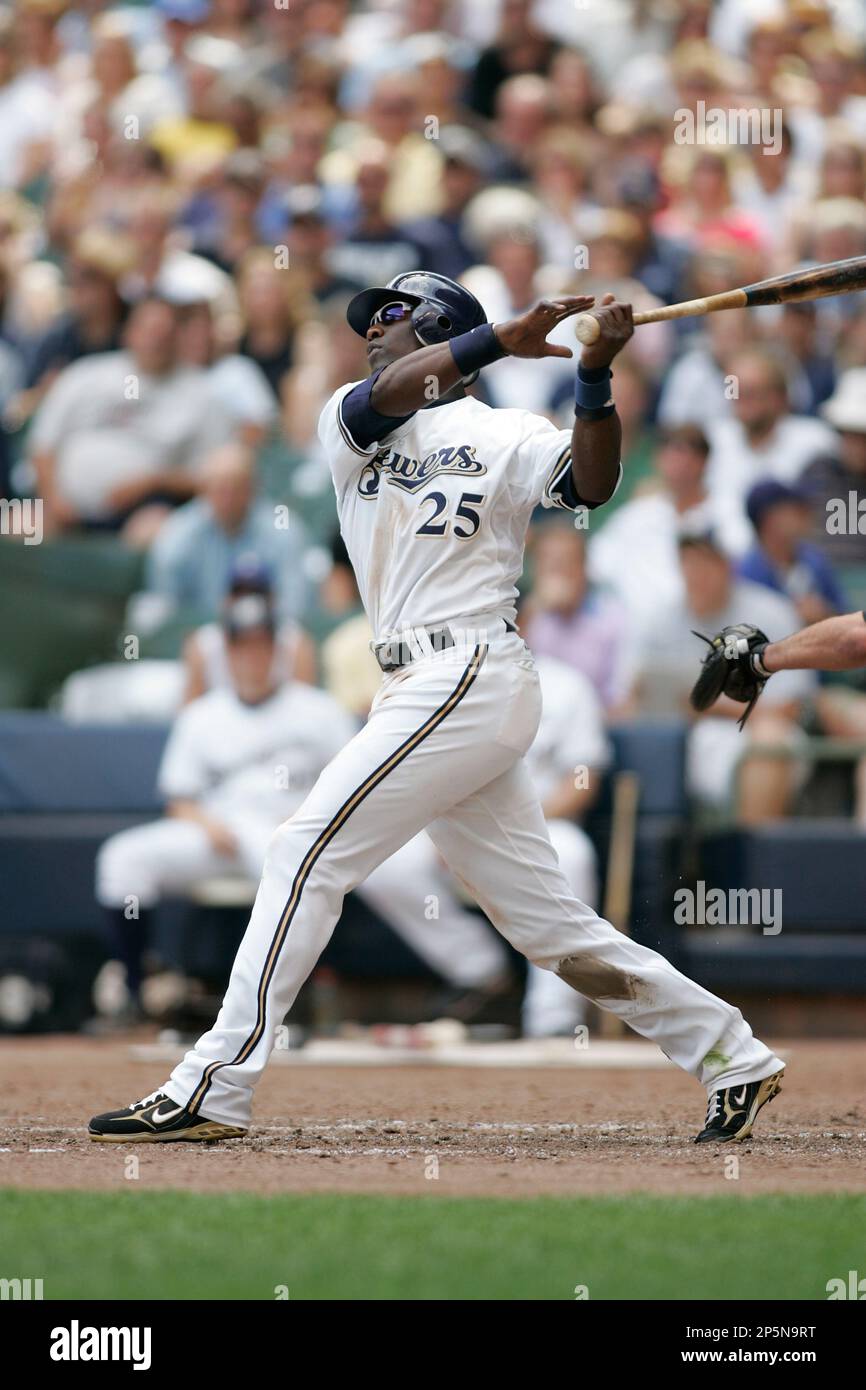 MILWAUKEE, WI - JULY 6: Outfielder Mike Cameron #25 of the Milwaukee Brewers follows through on his swing after hitting the baseball against the Pittsburgh Pirates at Miller Park on July 6, 2008 in Milwaukee, Wisconsin. The Brewers defeated the Pirates 11-6.(AP Photo/Scott Boehm) Stockfoto