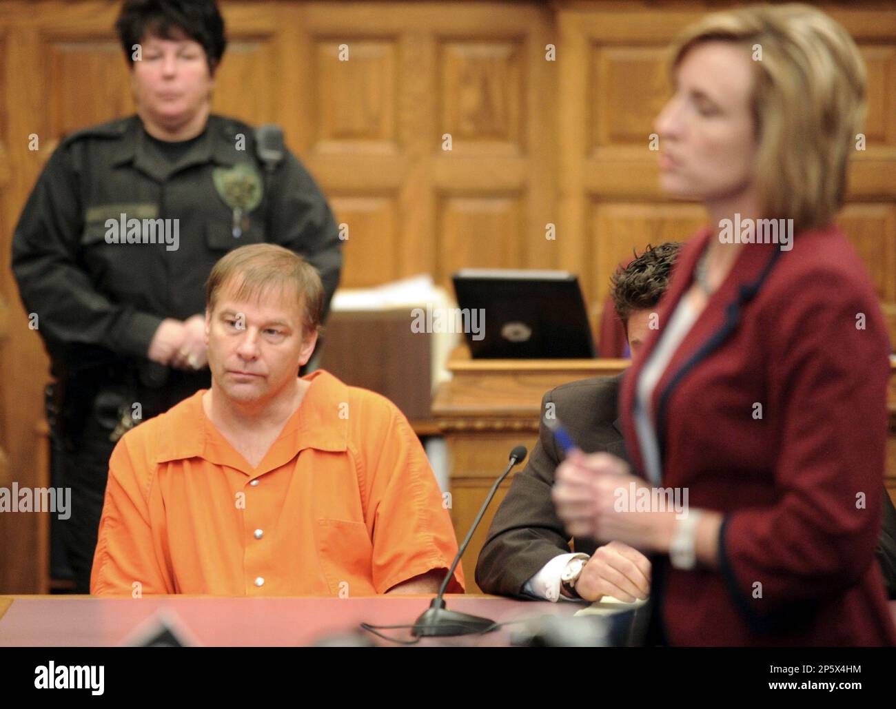 Scott Studer left listens as Assistant Stark County Prosecutor
