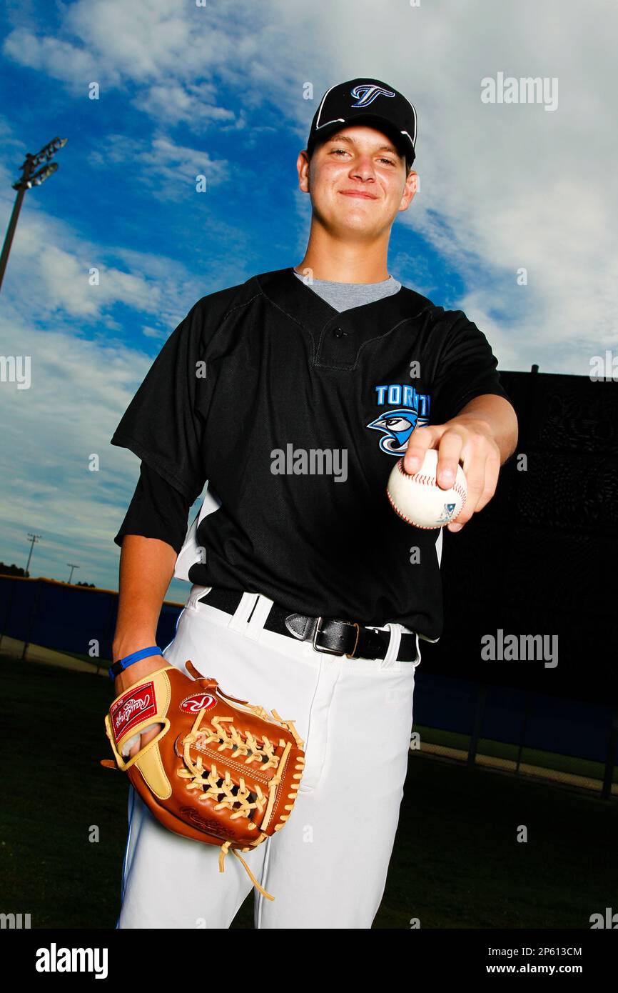 Toronto Blue Jays Justin Nicolino poses for a portrait at the Toronto Blue Jays training complex.Nicolino is reported to be traded to the Miami Marlins in a blockbuster deal.(AP Photo/Tom DiPace) Stockfoto