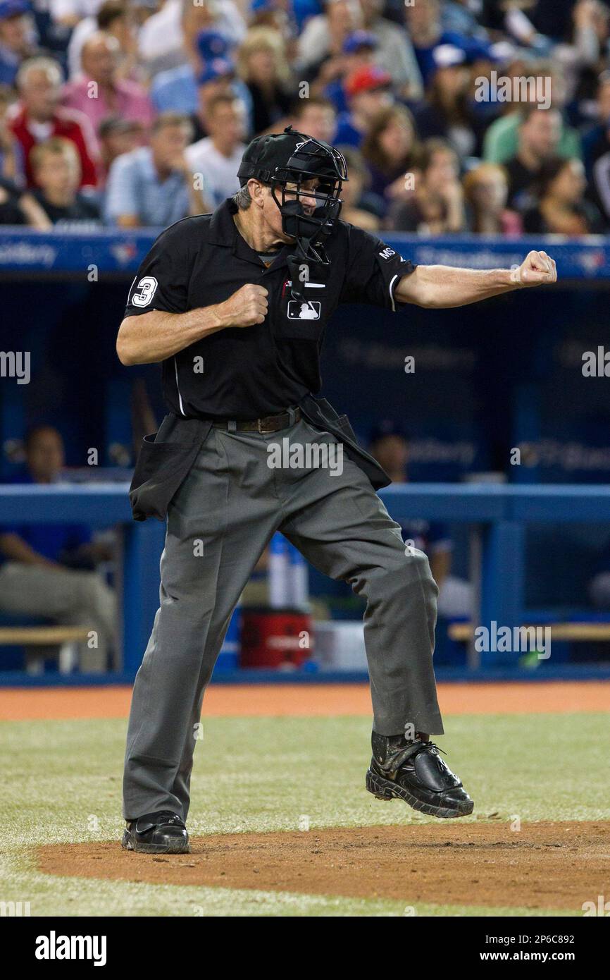 Home plate umpire Mike Winters makes a call during a game between the