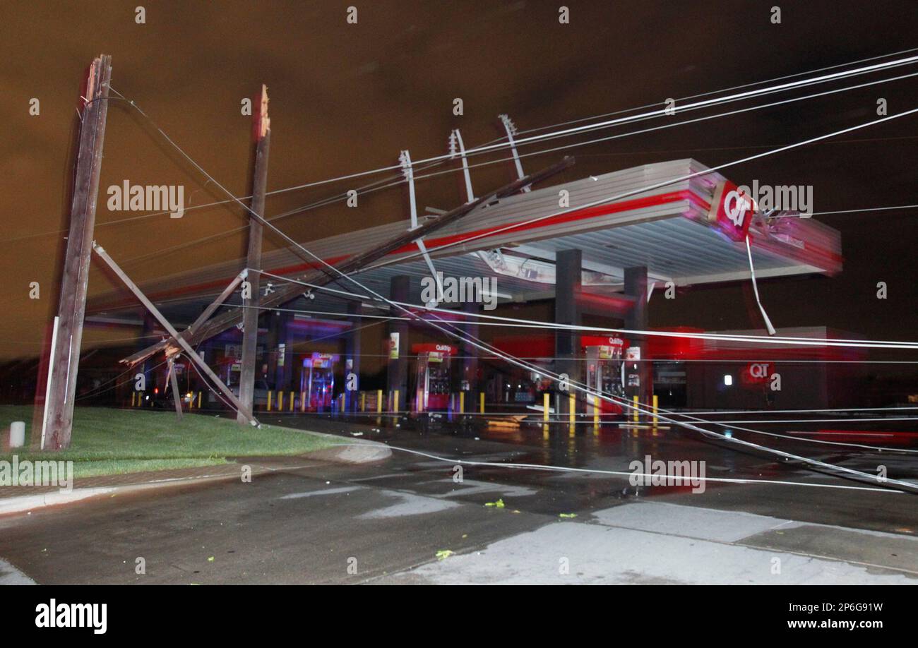 Downed power lines kept some people trapped in a Quiktrip at Rock and