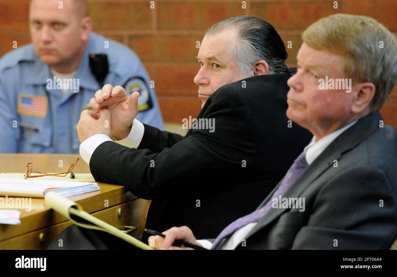 Richard Shenkman center and his attorney Hugh Keefe right listen as