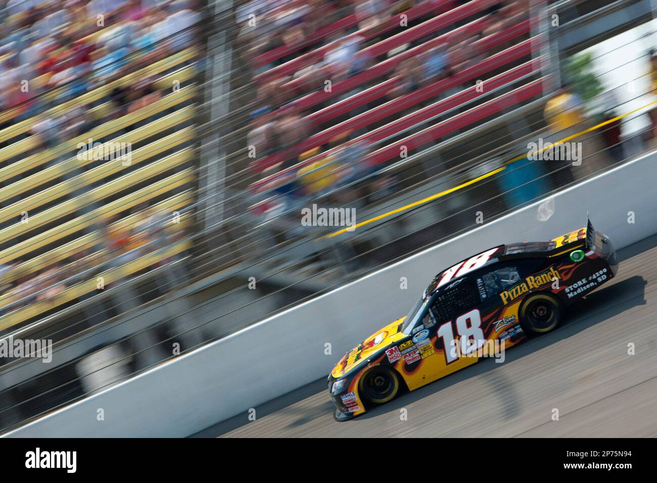 Brooklyn, MI - JUN 18, 2011: Kyle Busch (18) races down the front stretch for the Alliance Truck Parts 250 at Michigan International Speedway in Brooklyn, MI. (Cal Sports Media via AP Images) Stockfoto