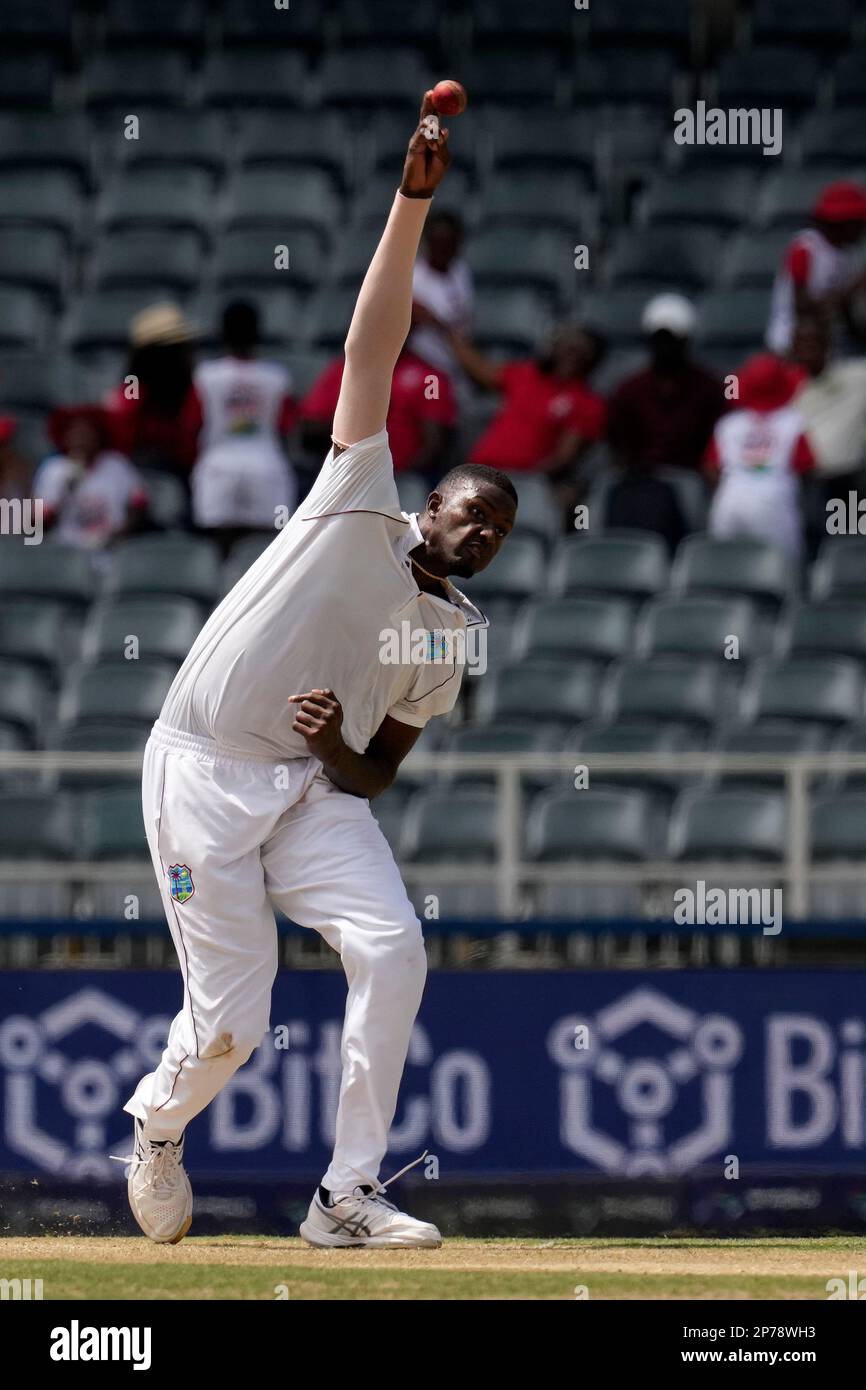 West Indies's bowler Jason Holder bowls during the first day of the