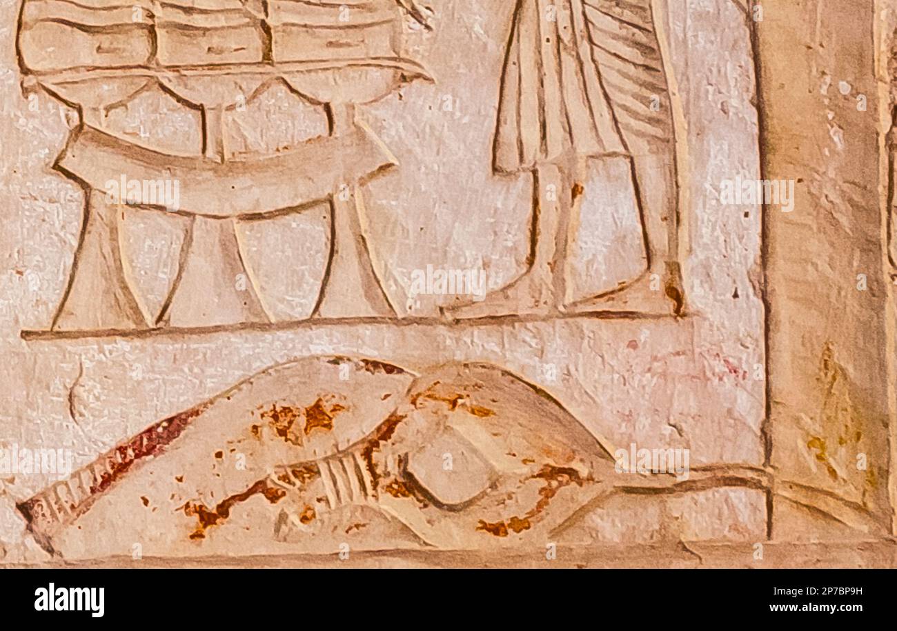 Ägypten, Sakkara, Grab von Horemheb, Nordwand des Innenhof, Bestattungsriten, Graffito unter dem Fuß des Mannes, der „Ra“ (der sonnengott) schreibt. Stockfoto