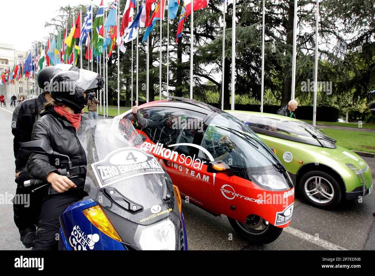 Electric vehicles from the Vectrix Team from Germany, left, Oerlikon Solar  Racing Team from Switzerland, center, and Team Trev from Australia, right,  pose prior to the start of the Zero Race Tour