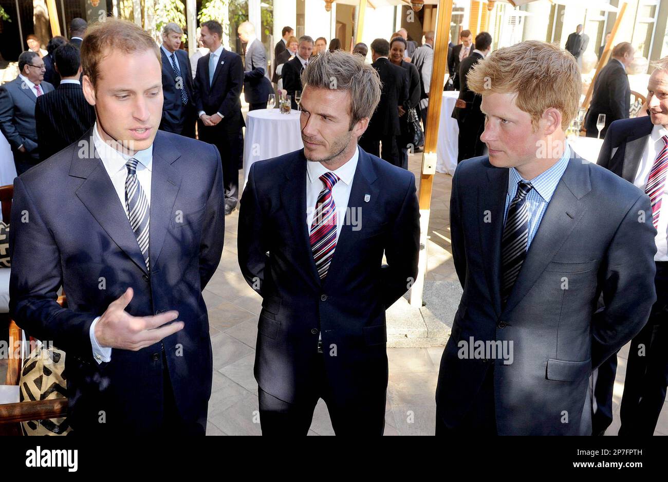 England team ambassador David Beckham, centre, Prince William, left, and Prince Harry at an FA reception at the Saxon Hotel in Johannesburg, South Africa, Saturday June 19, 2010. (AP Photo/Luca Ghidoni, Pool) Stockfoto