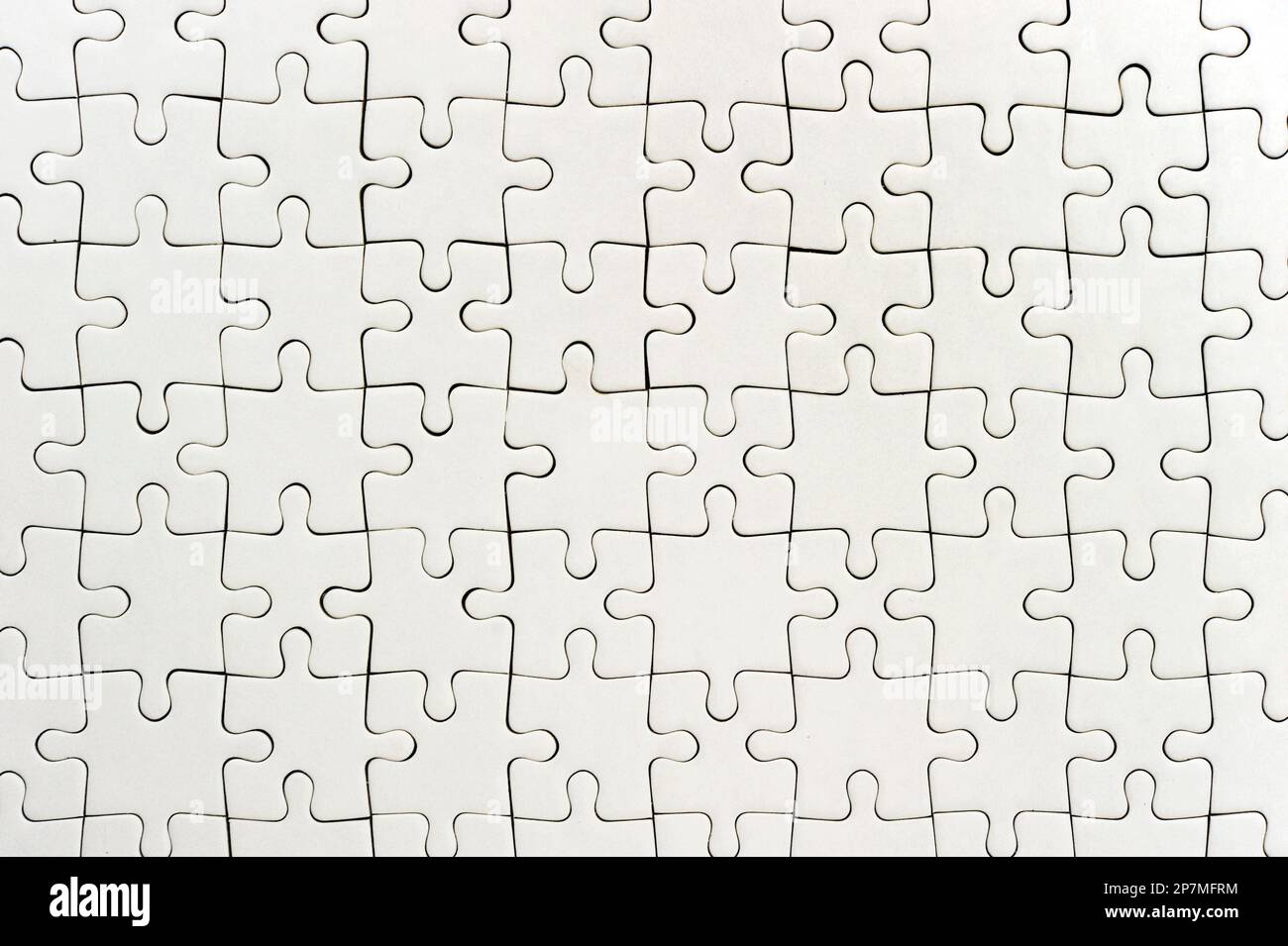 Leeres weißes Puzzle Stockfoto