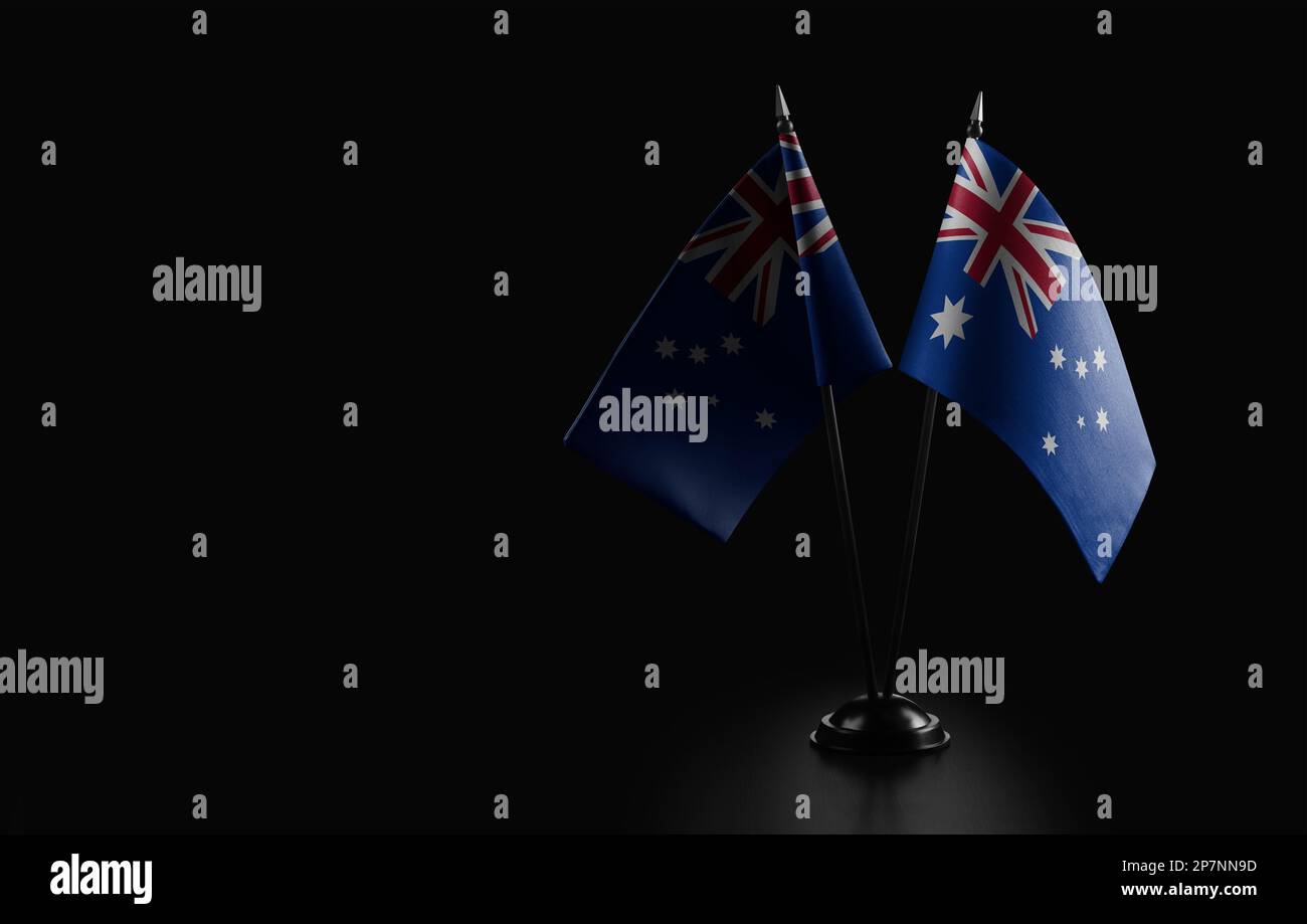 Kleine Nationalflaggen der Australien auf schwarzem Hintergrund. Stockfoto