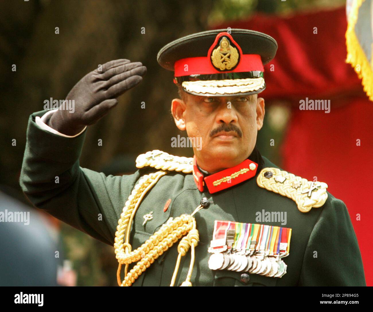 Former Sri Lankan army commander General Sarath Fonseka salutes as he ...