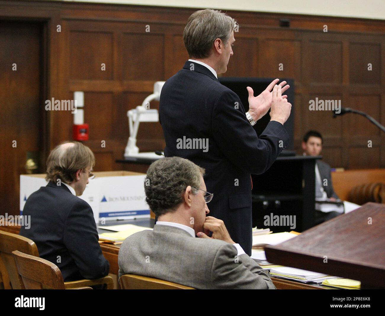 Defense Attorney Timothy Bradl, center standing, speaks on behalf of ...