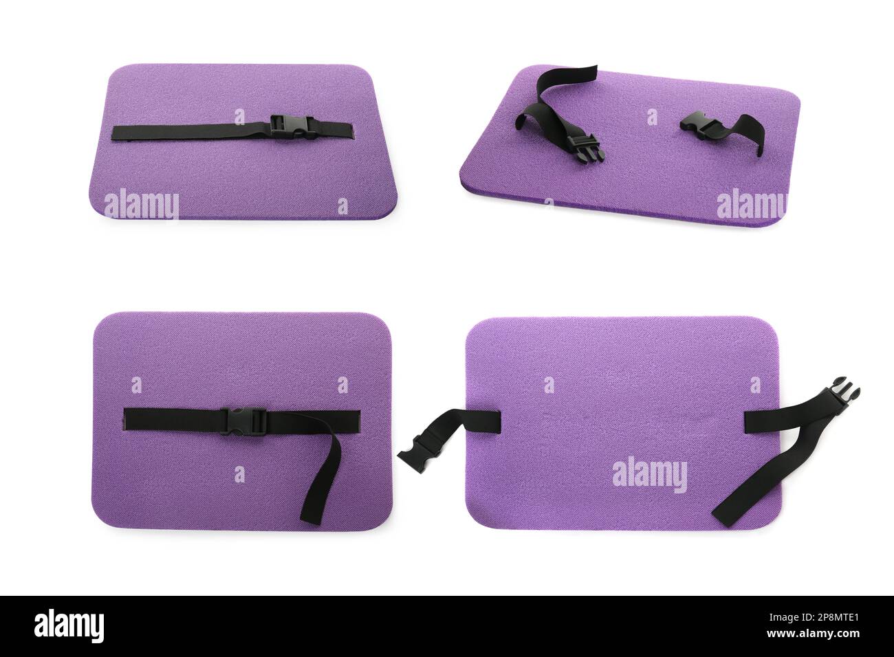 Set mit Touristenmatten aus violettem Schaumstoff auf weißem Hintergrund Stockfoto