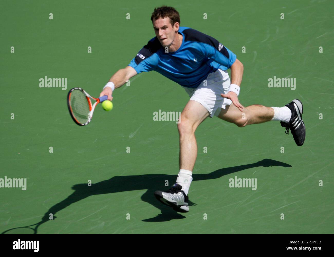 Andy Murray, of Britain, reaches for a shot from Ivan Ljubicic, of Croatia, at the BNP Paribas Open tennis tournament, Thursday, March 19, 2009, in Indian Wells, Calif. (AP Photo/Matt Slocum) Stockfoto