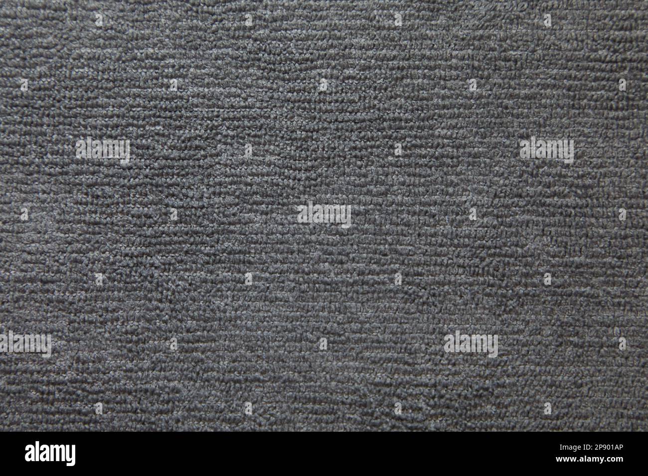 Graue Stoffhintergrundstruktur. Graues Stoffgewebe Textilmaterial. Stockfoto