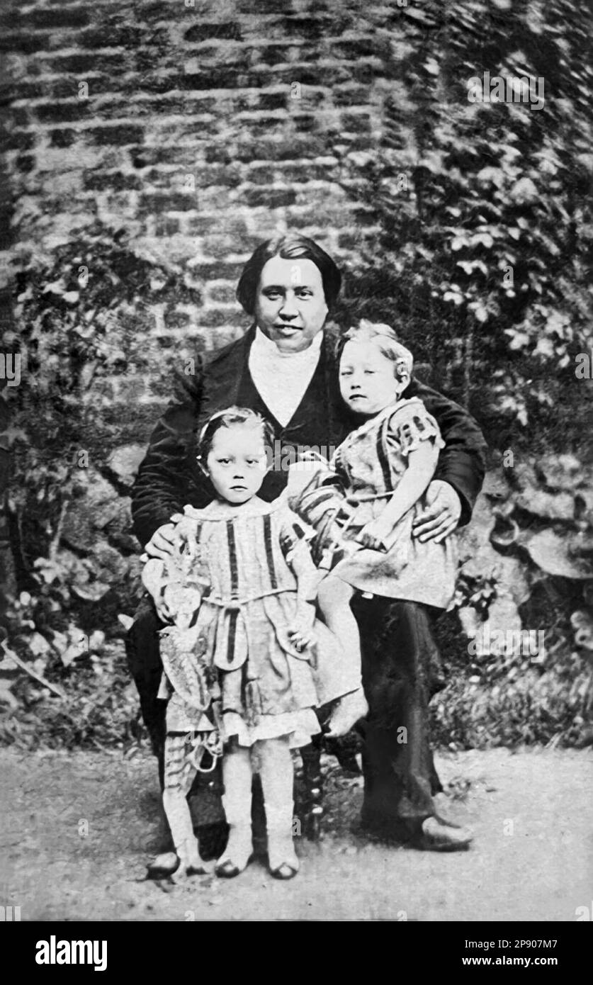 Charles Haddon (C.H.) Spurgeon (1834-1892), englisch-reformierter Baptistenpastor, mit seinen Zwillingssöhnen Charles Jr. und Thomas Spurgeon, c1859. Stockfoto