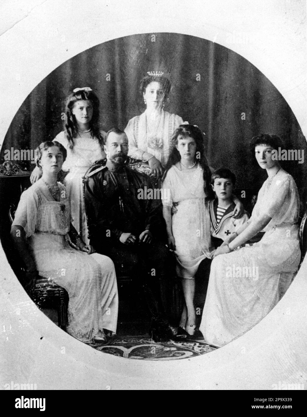 ** FILE ** Russia's Czar Nicholas II, seated second from left, Czarina Alexandra, center rear, and their family are shown in this undated file photo. Bottom row left to right, Princess Olga, Czar Nicholas II, Princess Anastasia, Prince Alexei and Princess Tatiana. Top row left to right, Princess Maria and Princess Alexandra. Russians attended church ceremonies Wednesday marking 90 years since the last czar and his family were murdered by the Bolsheviks, while investigators reaffirmed that remains unearthed last year were those of Nicholas II's only son and daughter Princess Maria. (AP Photo/Fi Stockfoto