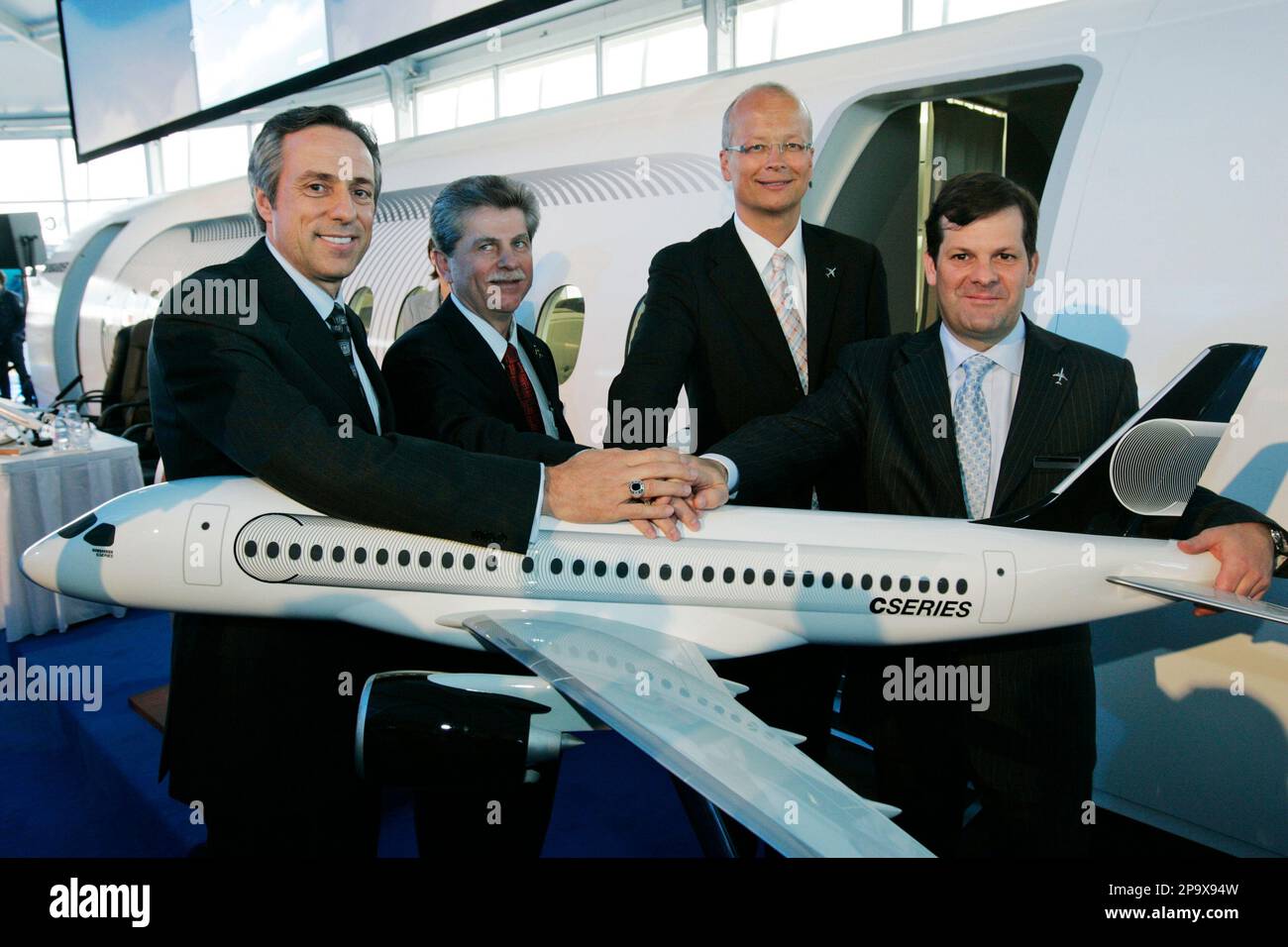 from-left-to-right-guy-c-hachey-president-and-coo-of-bombardier
