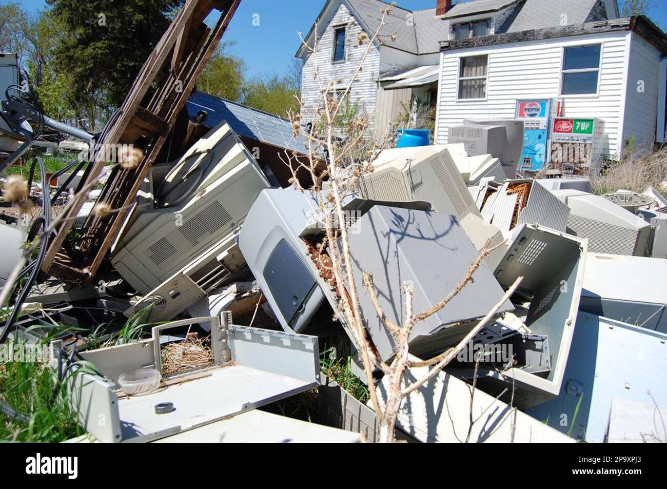 A large pile of discarded electronics is seen on a farm in Glenwood