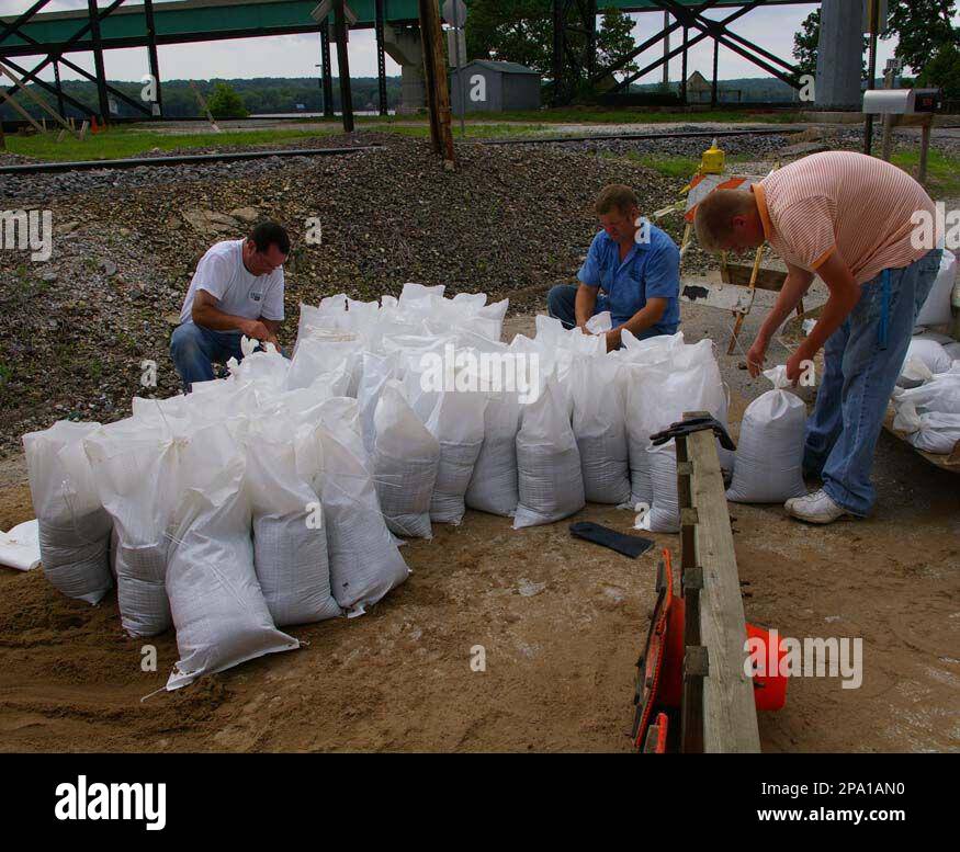 From left, volunteer John Miller and Keokuk Water Works employees Jim Bowden and Weston Kleinert