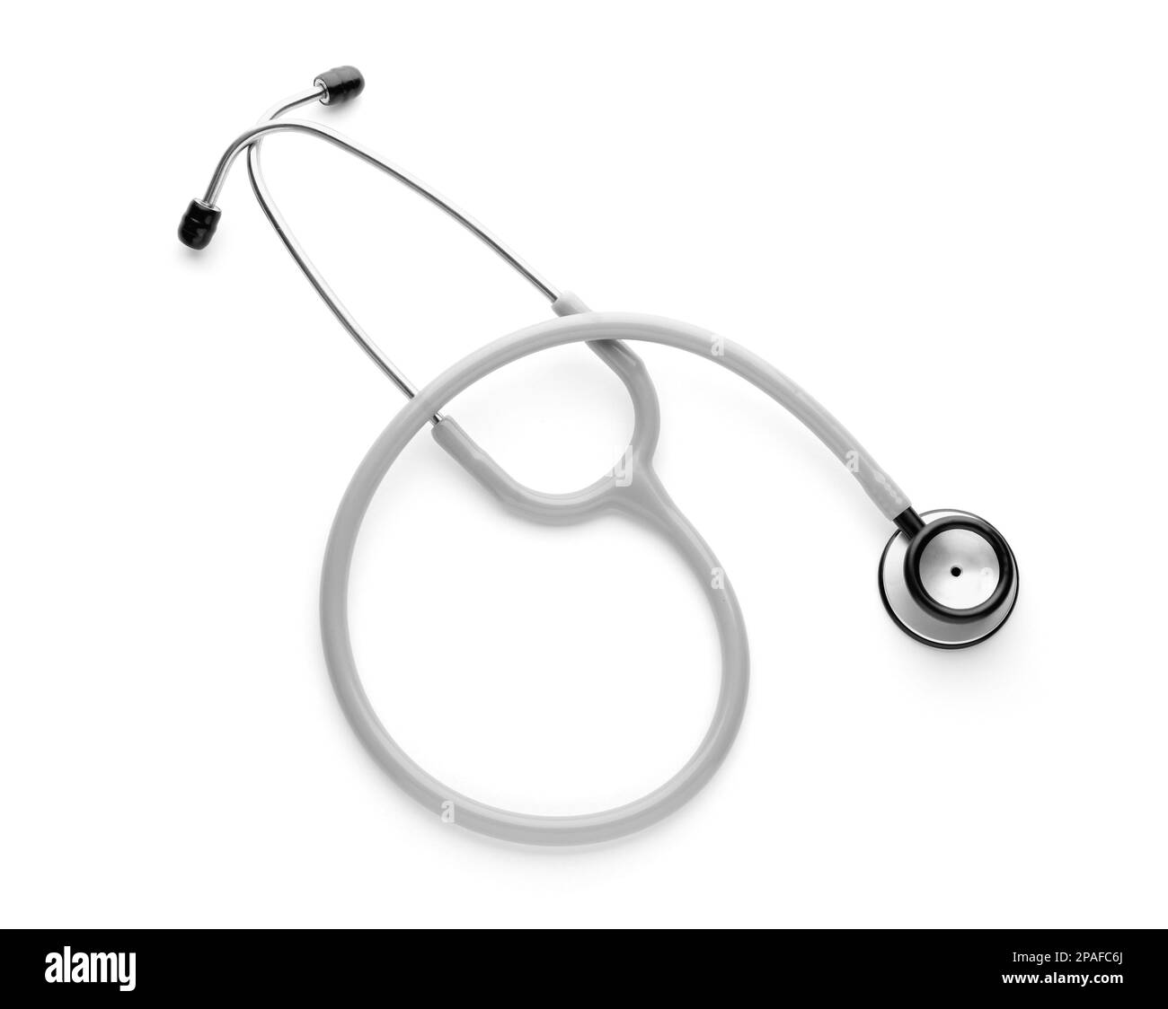 Stethoskop isoliert auf weiß, Draufsicht. Medizinisches Objekt Stockfoto