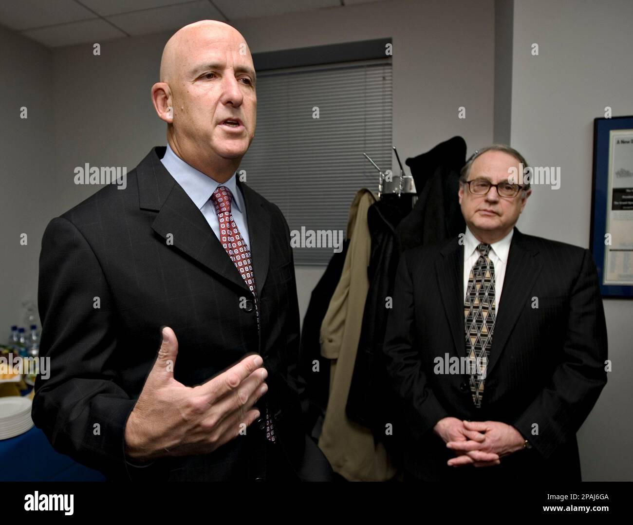 Professional sports agent David Falk, left, the founder and CEO of F.A