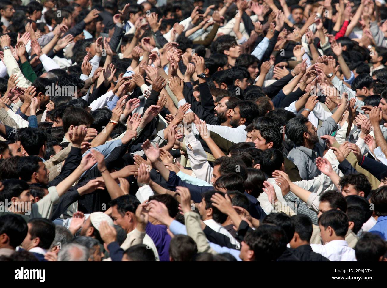 Pakistani Shiite Muslims beat their chest during a procession to mark ...