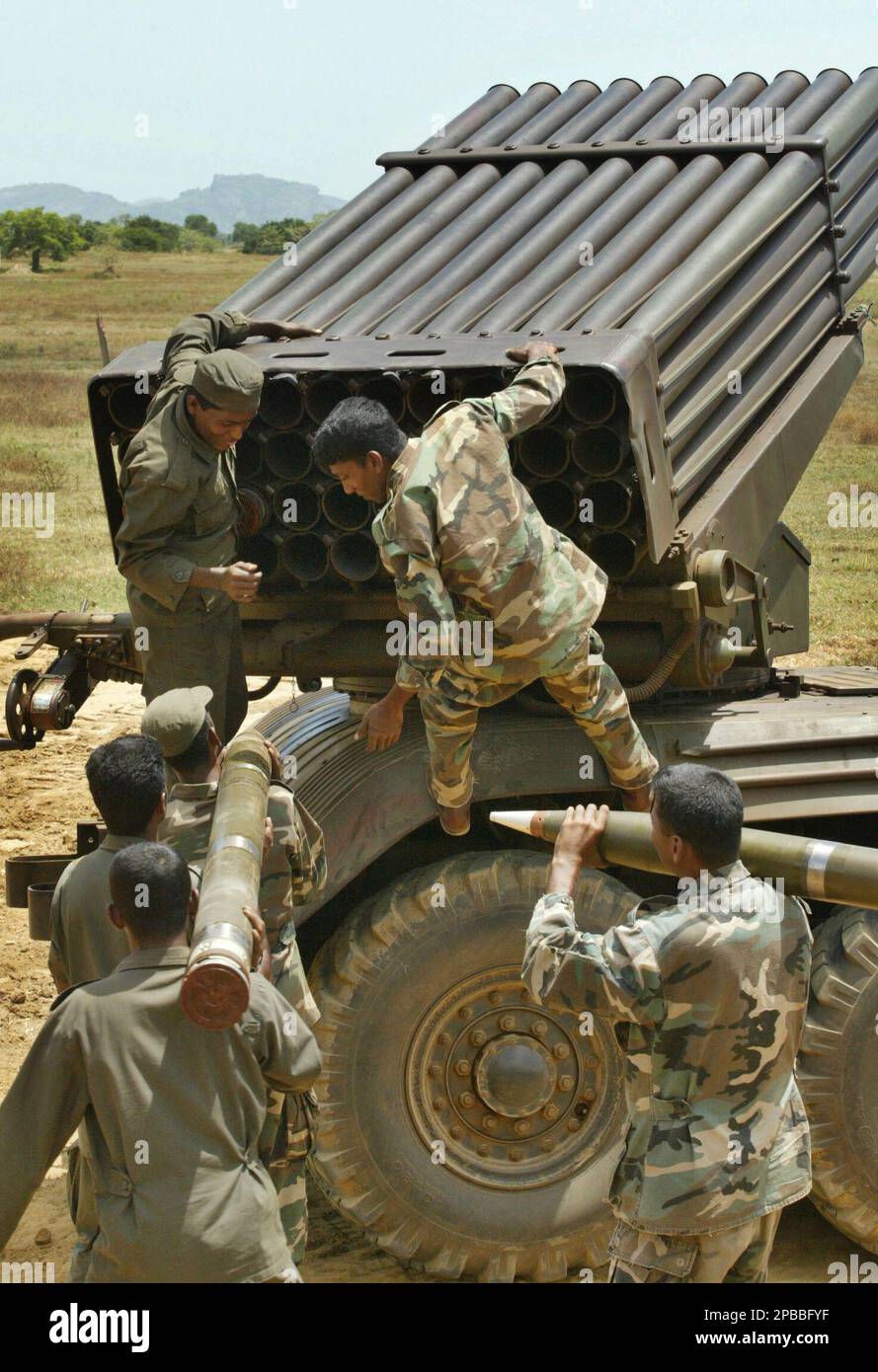 Colombo Roket Sri Lankan troops load rockets in to a multi barrel rocket launcher to ...