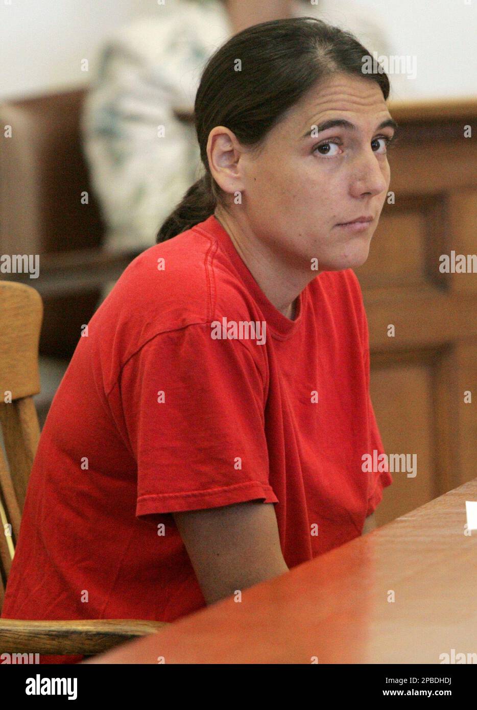 melanie-paquette-cooper-listens-during-her-sentence-review-hearing-for
