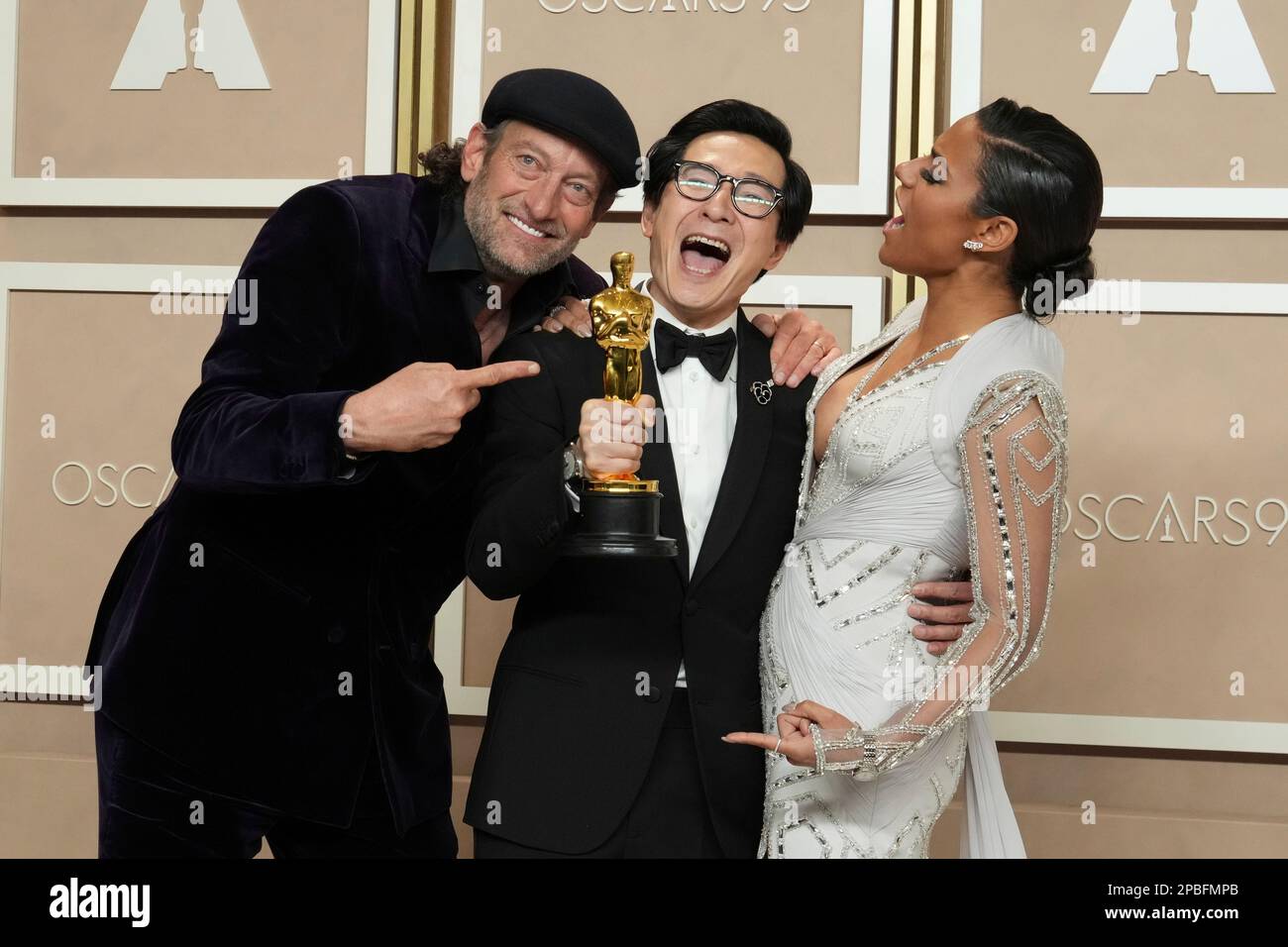 Ke Huy Quan, center, winner of the award for best performance by an