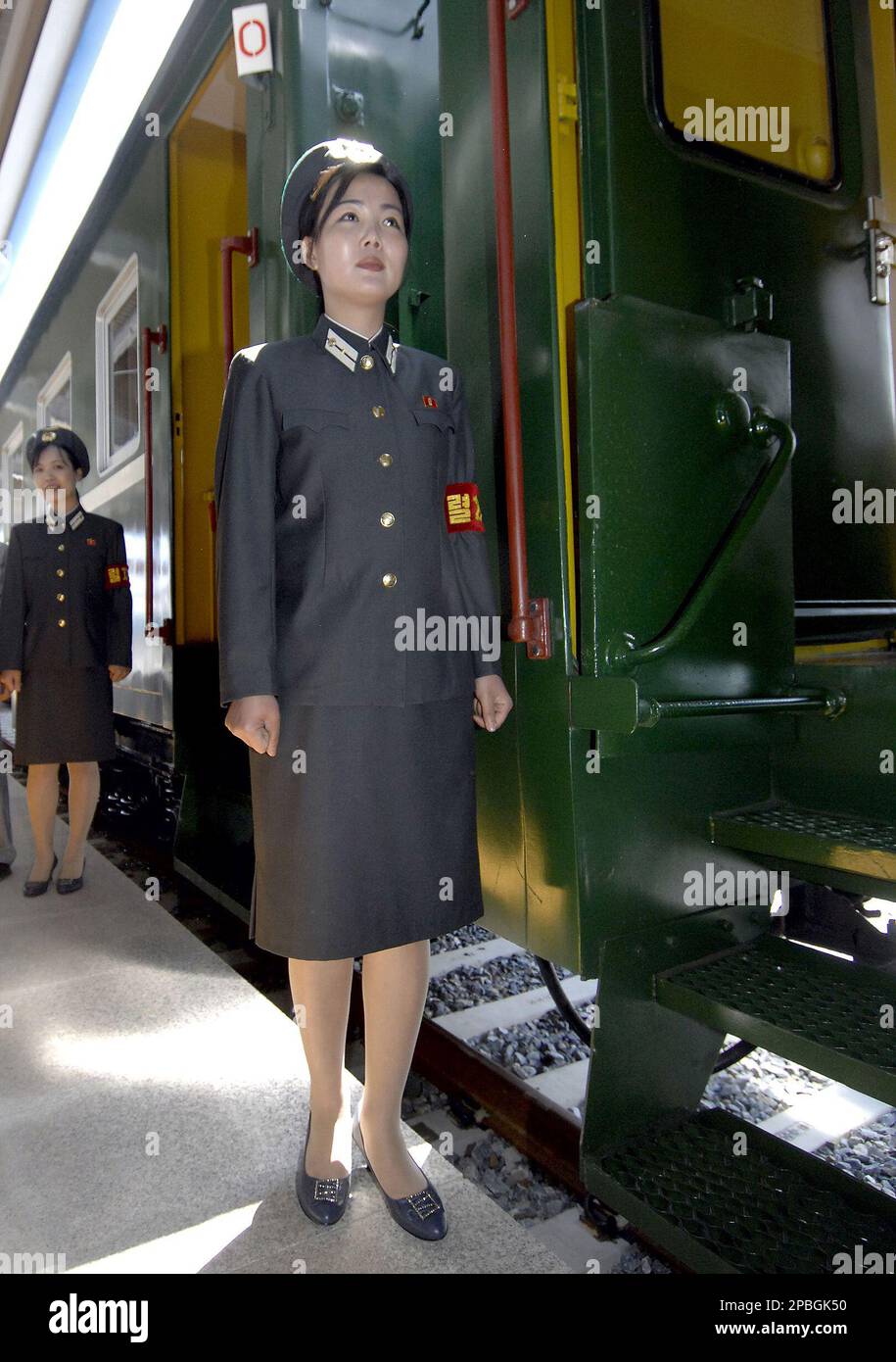 Jejin North Korean train crew stand by a train after their arrival from North ...