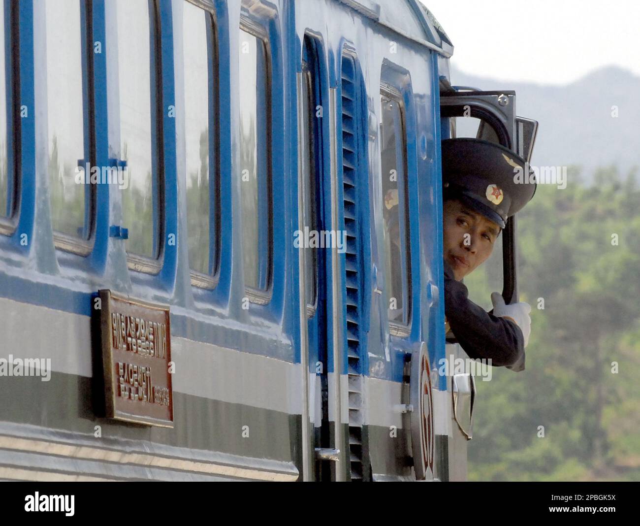 Jejin A North Korean train driver looks on as he leaves for the North during ...