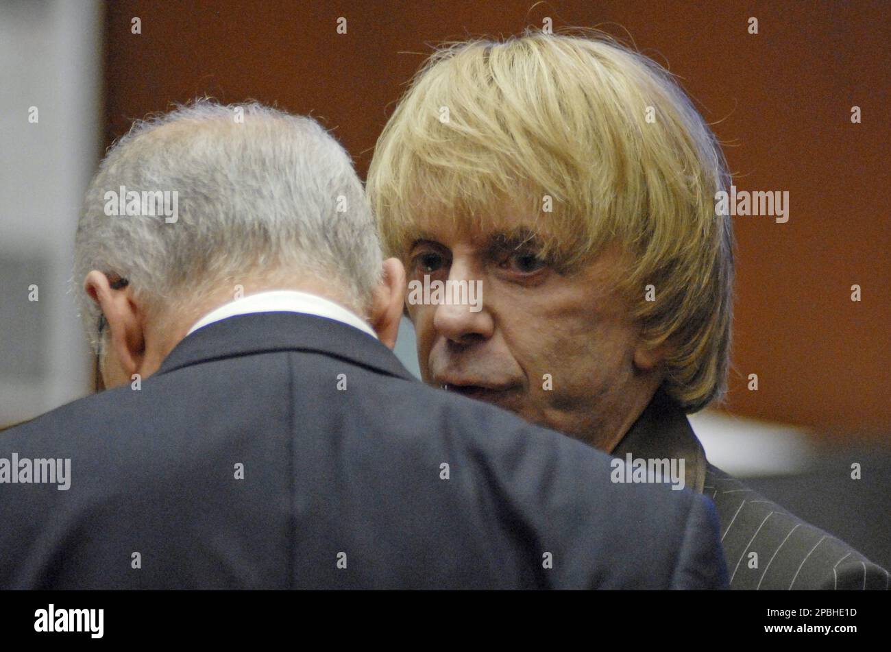 Music producer Phil Spector, right, speaks with his attorney Roger ...
