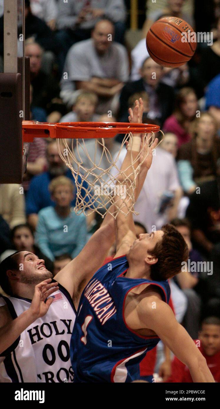 Holy Cross center Tim Clifford and American forward Brain Gilmore battle for a rebound in the second half of their Patriot League tournament semifinal basketball game Sunday, March 4, 2007, in Worcester, Mass. Holy Cross defeated American University 55-53 to advance to the Patriot League championship game. (AP Photo/Greg M. Cooper) Stockfoto