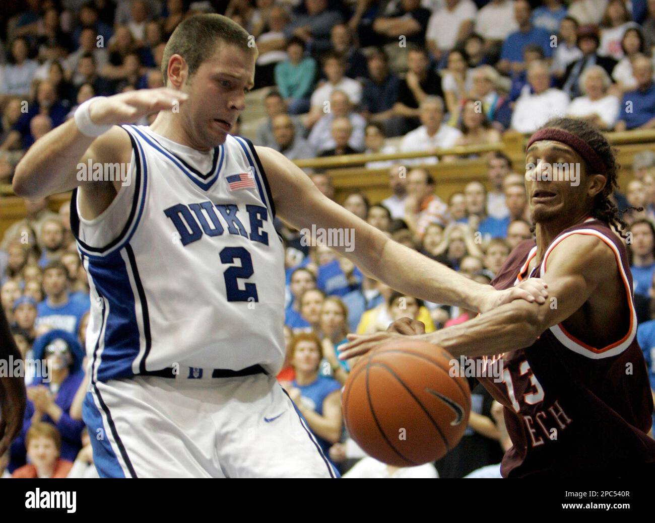Duke's Josh McRoberts (2) and Virginia Tech's Deron Washington (13