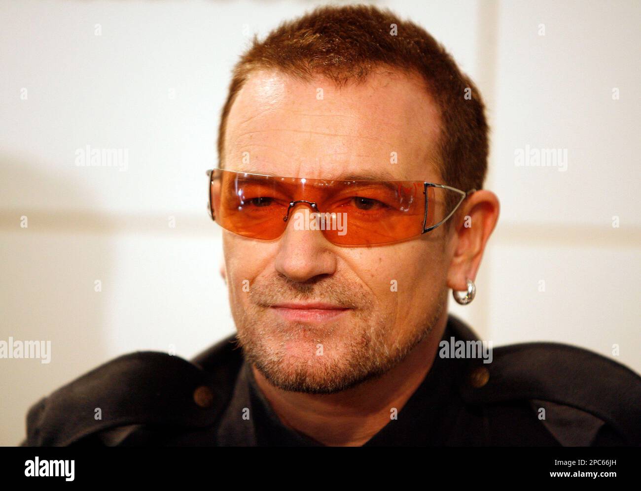 ** FILE ** Bono of the band U2 signs copies of the new book "U2 by U2 - How Old Is Bono? U2 Frontman's Age, Music Legacy & Activism