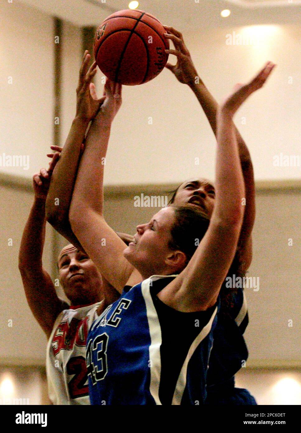 Duke's Alison Bales, front, battles for a rebound with SMU's Elbie