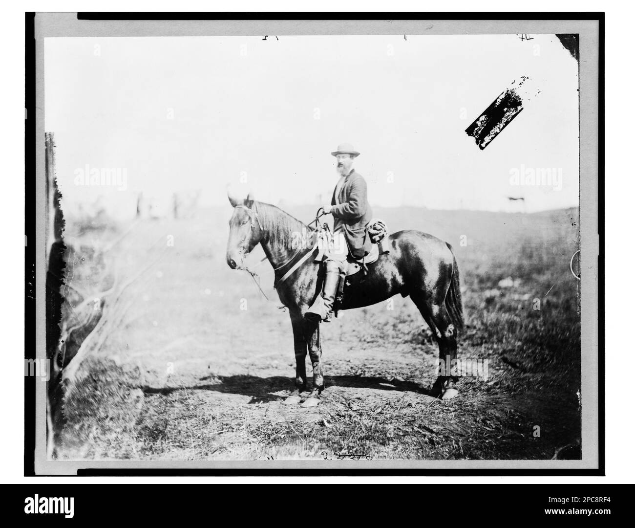 William Wilson, Pfadfinder, Hauptquartier, Armee des Potomac, auf dem Pferd, Porträt in voller Länge, mit Blick nach links, Culpeper, Virginia / Foto von James Gardner... Sammlung unverarbeiteter Fotografien aus dem Bürgerkrieg, LC-B817-7127 (urig. Glass neg.). Vereinigte Staaten, Armee des Potomac, Volk, 1860-1870, Vereinigte Staaten, Geschichte, Bürgerkrieg, 1861-1865, Militärpersonal, militärische Späher, Union, Virginia, Culpeper, 1860-1870, Pferde, Virginia, Culpeper, 1860-1870. Stockfoto