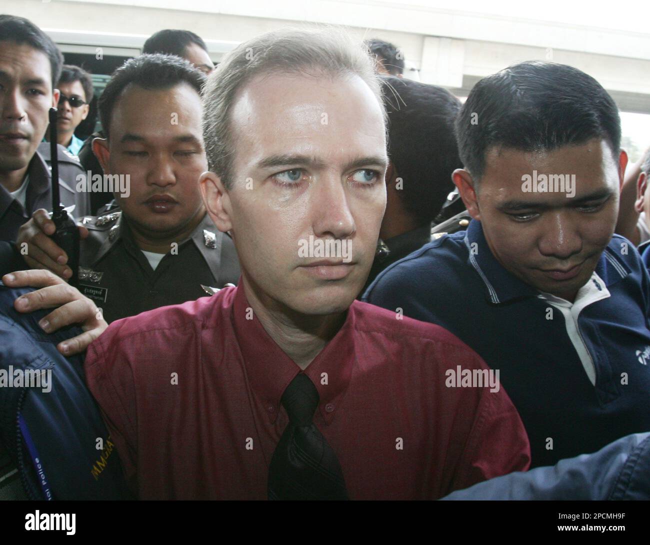 An American suspect John Mark Karr arrives at Bangkok International