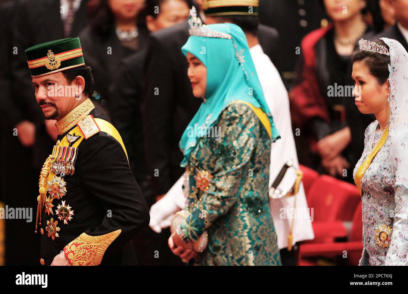 Brunei's Sultan Hassanal Bolkiah left, with his first wife Queen Saleha