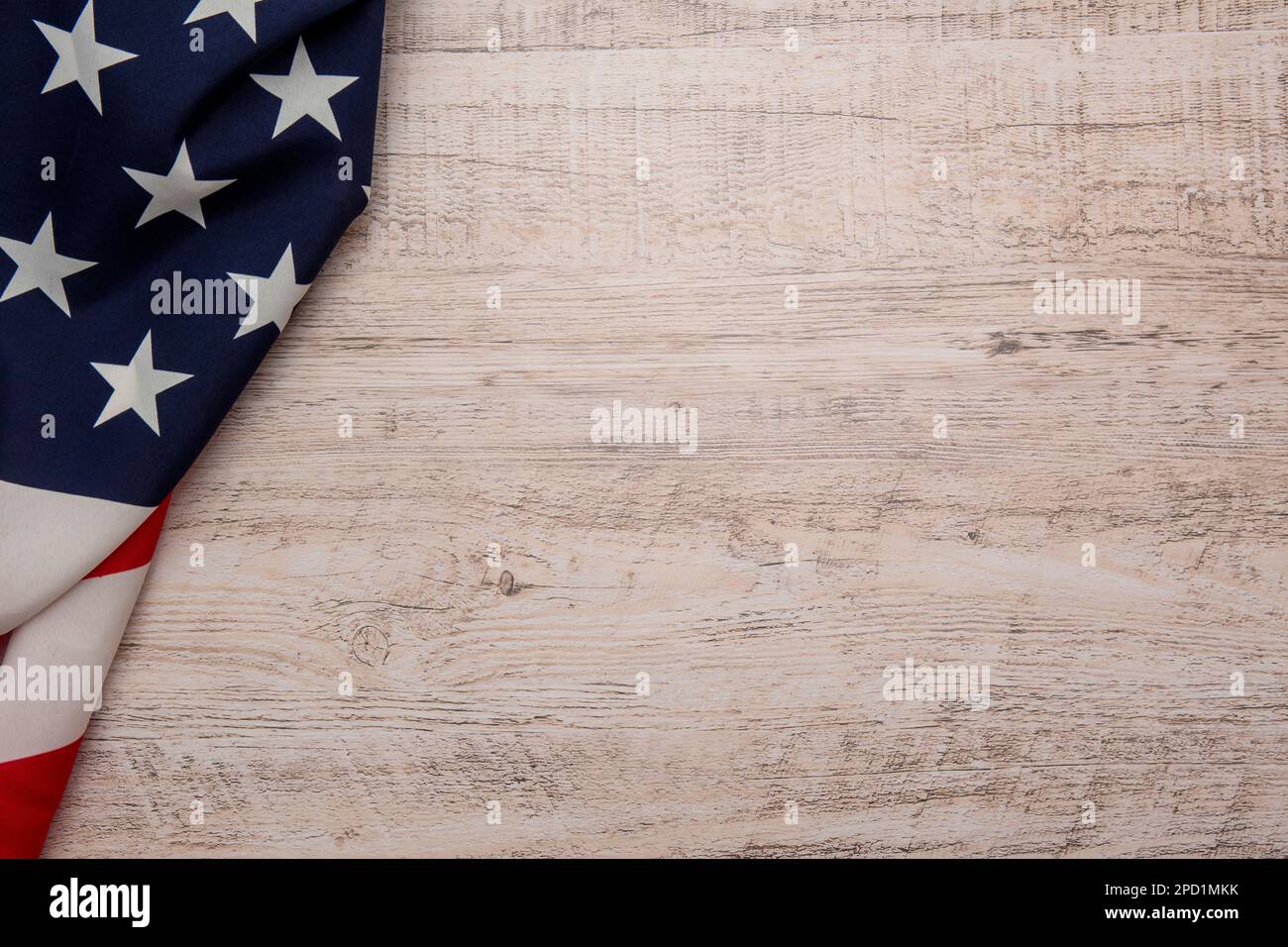 Die Sternchen der us-Flagge in der oberen linken Ecke auf Holzhintergrund Stockfoto