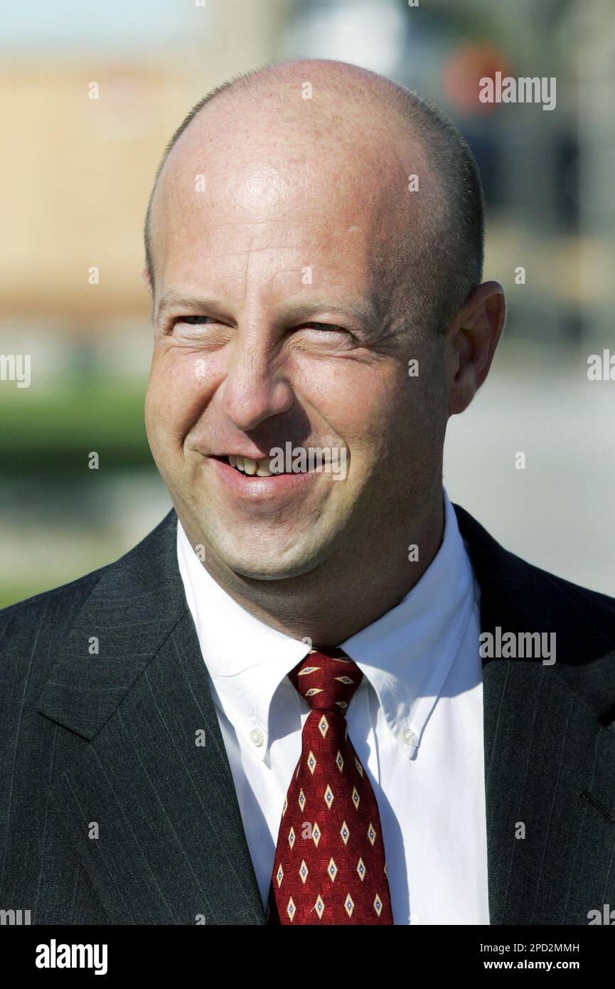 Prosecution witness Lanny Young smiles before entering federal court