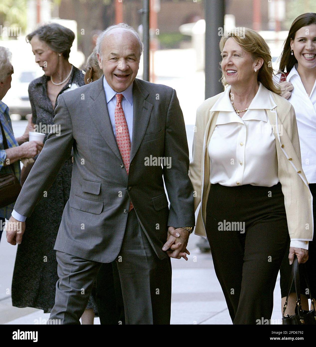 Enron founder Ken Lay, left, and his wife Linda return to the federal