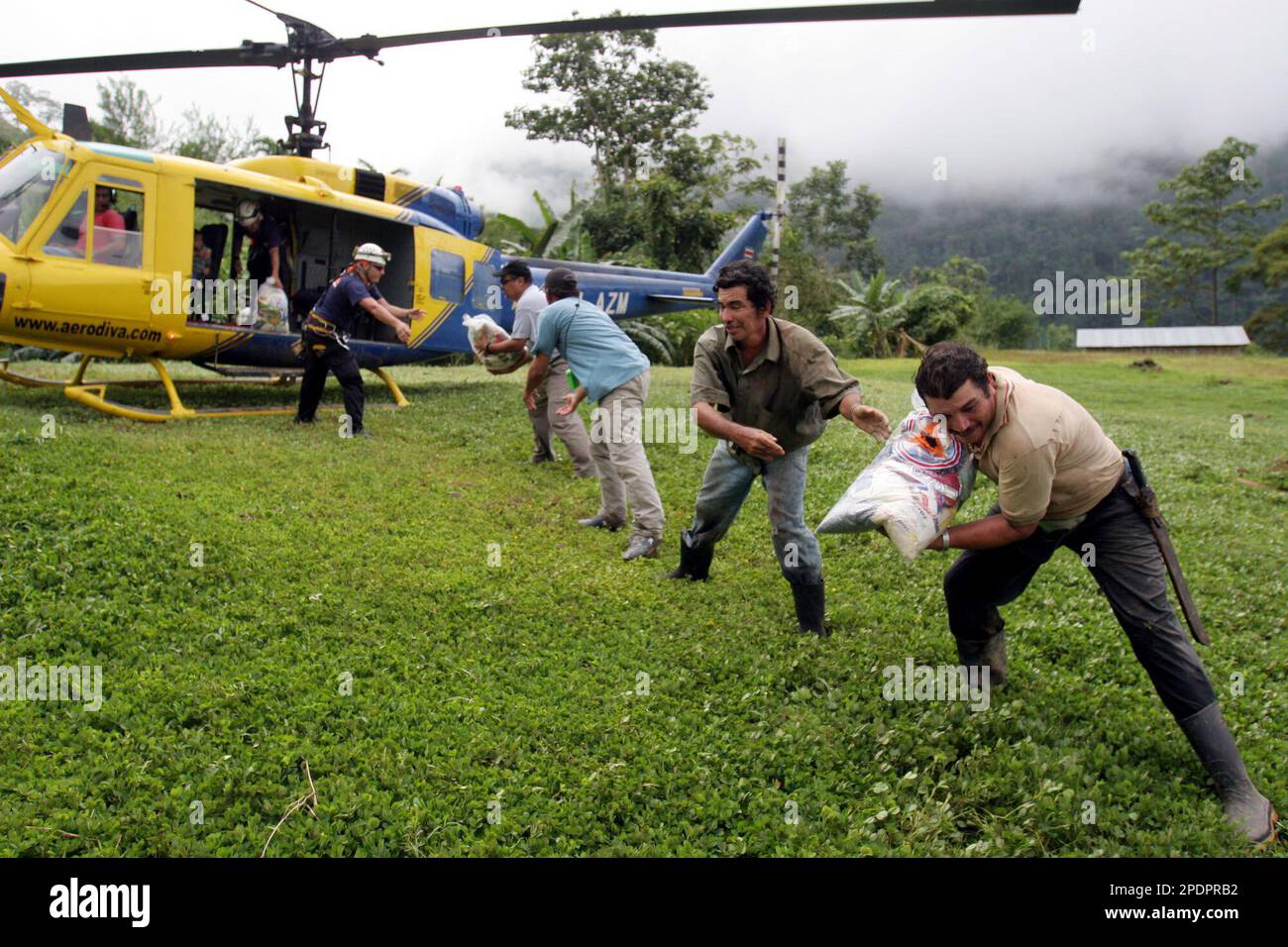 Costa Rican Red Cross workers deliver food to residents stranded by ...
