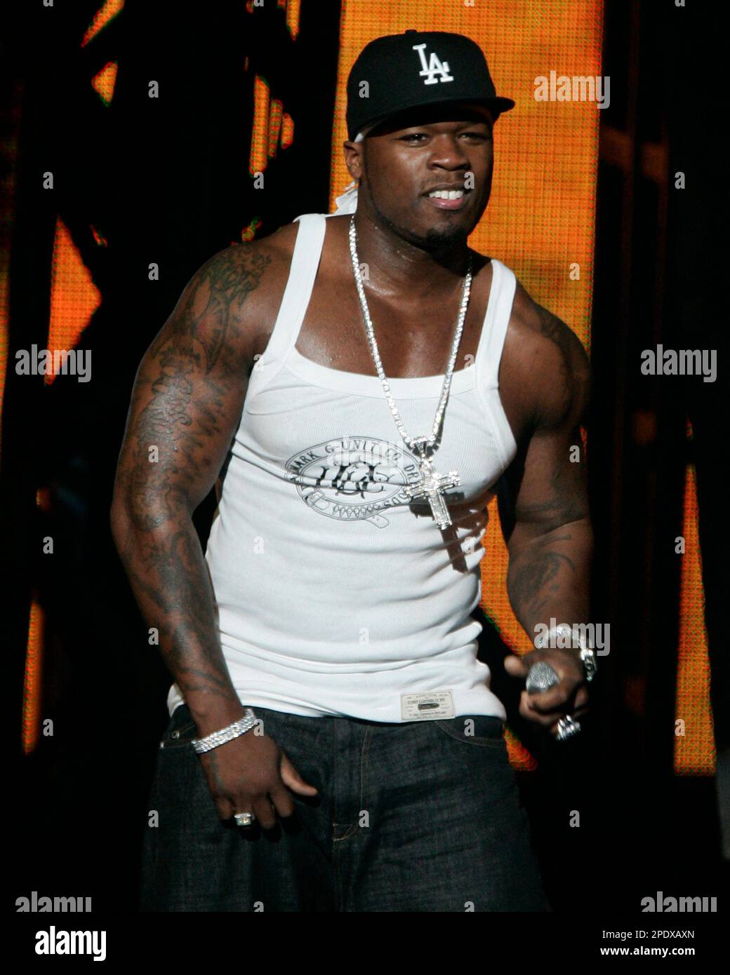 Rapper 50 Cent, formerly known as Curtis Jackson, performs with G-Unit at  the Tweeter Center in Mansfield, Mass., Monday, August 22, 2005, as part of  his Massacre Tour 2005 to promote his