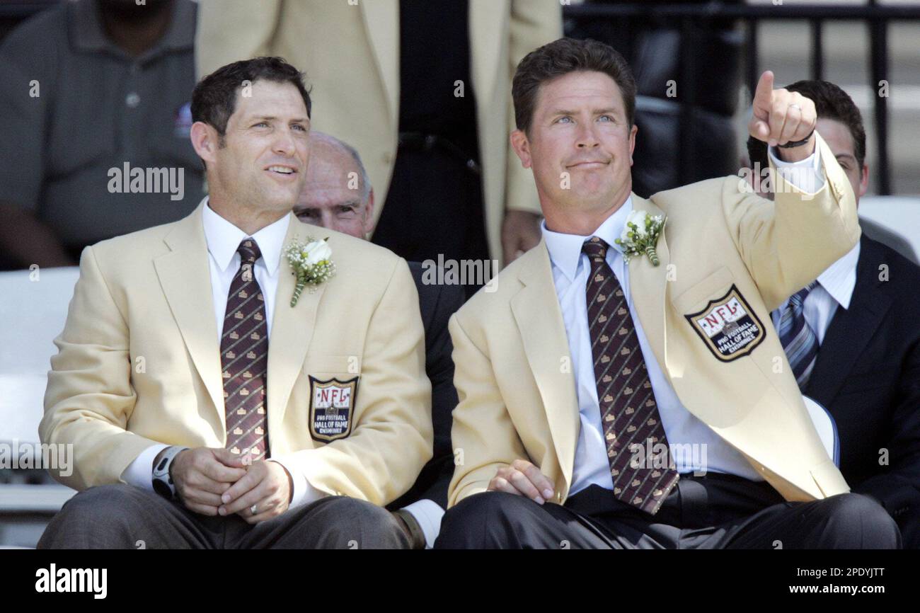 Former San Francisco 49ers Quarterback Steve Young Left To Right And former-san-francisco-49ers-quarterback-steve-young-left-to-right-and