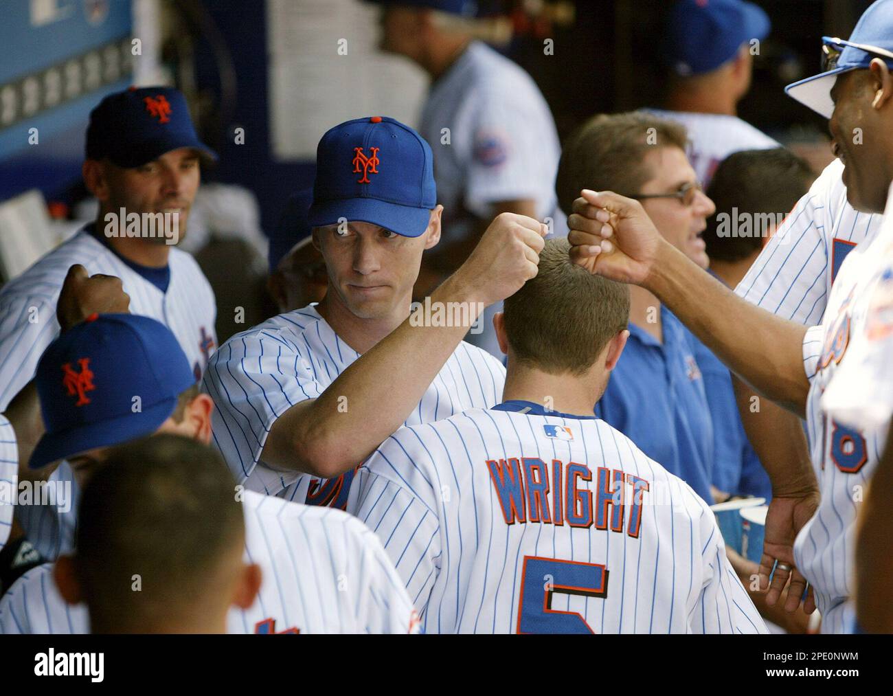 Teammates congratulate New York Mets pitcher Kris Benson after he ...