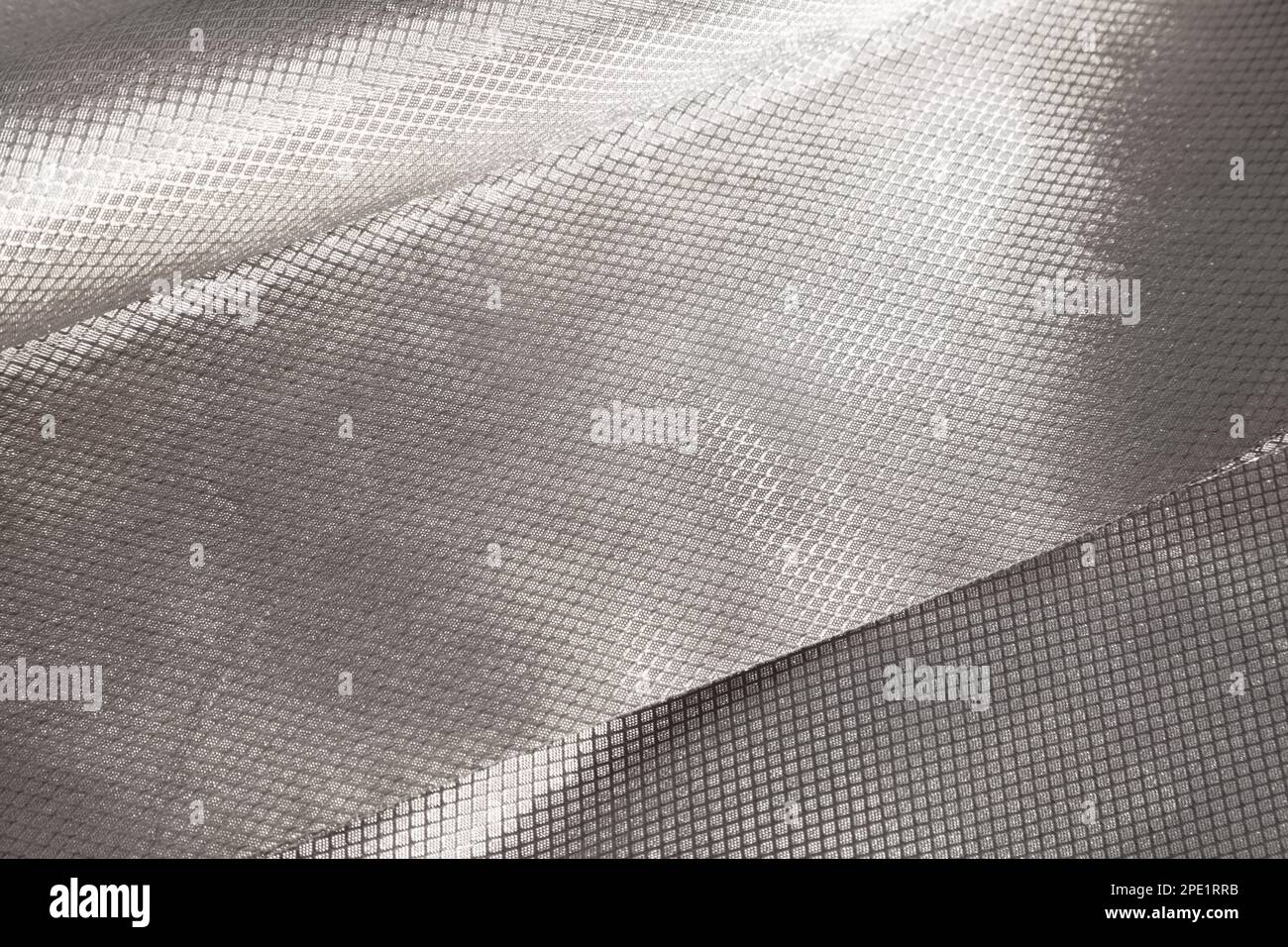 Schutz-RFID, EMI, Zellsignal-blockierende Faraday-Stoffe. Abschirmung von leitfähigem Tuch mit Metallgitter, das drahtlose Signale und EMF-Strahlung blockiert Stockfoto