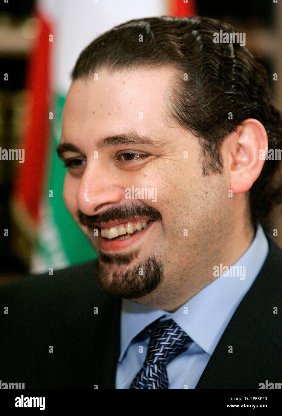 Saad Hariri, son of Lebanon's slain former Premier Rafik Hariri, gestures during an interview in his palace in Beirut, Monday, June 13, 2005. Hariri, who is leading Lebanon's opposition in parliamentary elections, said on Monday he was not concerned about a surprisingly strong show by competitor Michel Aoun in recent elections and expressed hope of ultimately swinging the vote in his own favor in the last stage of voting in northern Lebanon. (AP Photo/Hussein Malla) Stockfoto