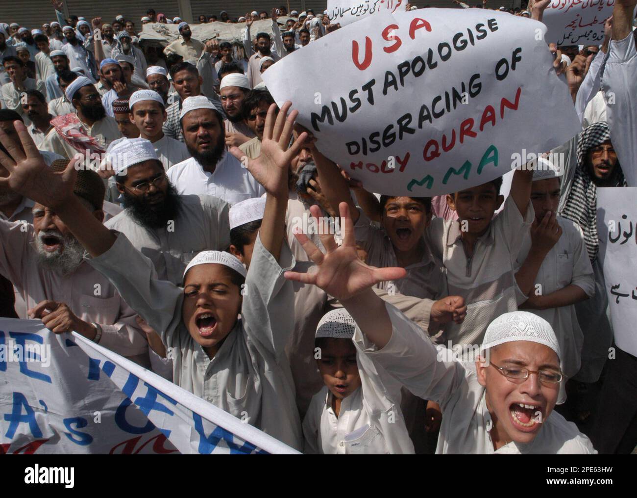 Pakistani religious students chant anti-American slogans at a rally to ...