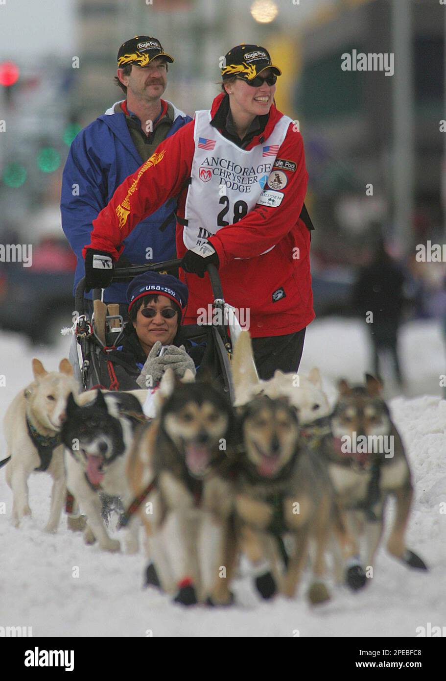 Two Rivers, Alaska, musher Aliy Zirkle, center, with Kathy Phillips in
